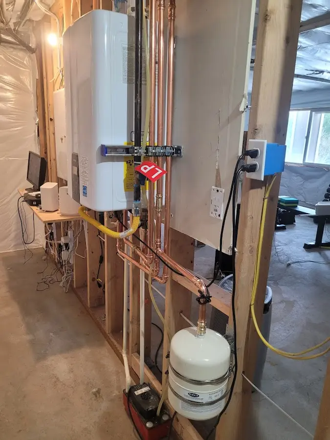Licensed plumber repairing a kitchen sink in Chocolay